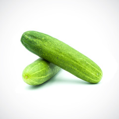 Two cucumbers on a white background