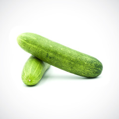 Two cucumbers on a white background