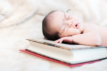 Asian newborn. Lovely kid and little child of parent.