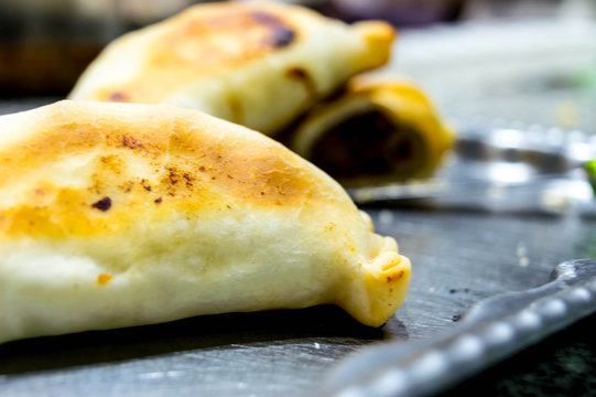 Meat empanadas with olives and red pepper.