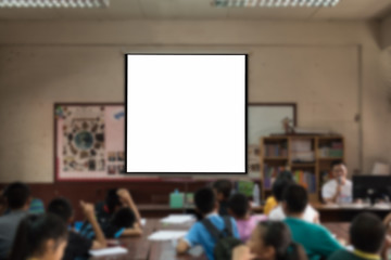 Abstract blurred image of classroom teacher and students with blank space on board