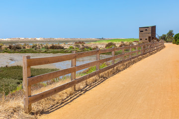 Fototapeta na wymiar Coastal area in Portugal with path fence and hut