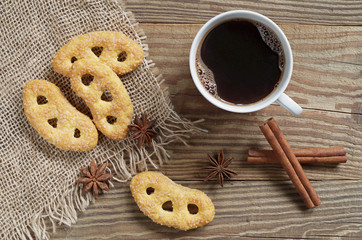 Fototapeta na wymiar French pretzels with sugar and coffee