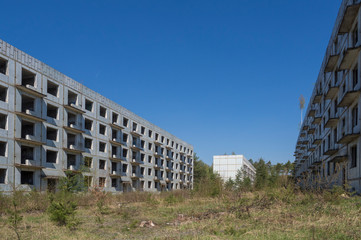 Obraz premium Abandoned ruined block of flats, former Russian soldier houses at uranium mining city Ralsko, Czech Republic, former military zone area was occupied by Soviet troops between 1968 and early 1990s.