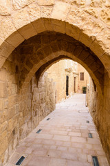 Fototapeta na wymiar Narrow streets at the Citadella Citadel, Victoria, Gozo, Malta