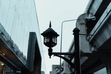 Fototapeta na wymiar street lamp in front of building