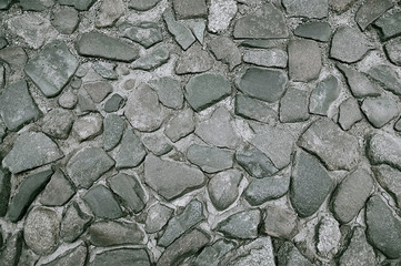 Old grey stone pavement background