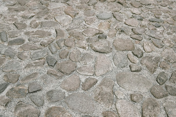 Old grey stone pavement background texture
