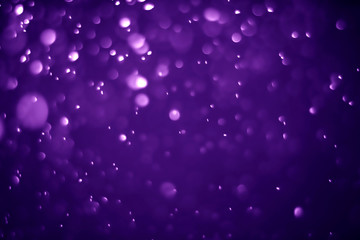 Obraz premium Bokeh purple proton background abstract