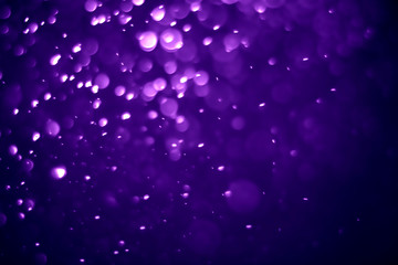 Bokeh purple proton background abstract