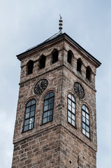 Fototapeta na wymiar Sarajevo, Bosnia: the Sarajevska sahat kula, the Clock Tower built by Gazi Husrev-beg, governor of the area during the Ottoman period, the tallest of 21 clock towers in the country 