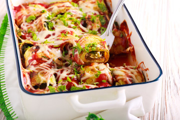 Zucchini rolls with cheese and spinach