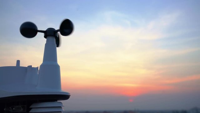 Weather vane wind gauge for direct and strength. sunset color in background., Lockdown.