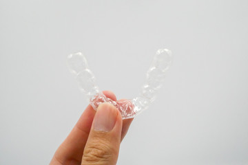 Clear plastic retainer teeth, it's a new technology equipment for orthodontist give the patient to orthodontic surgery in dental clinic or hospital