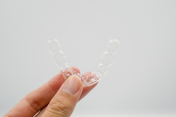 Clear plastic retainer teeth, it's a new technology equipment for orthodontist give the patient to orthodontic surgery in dental clinic or hospital