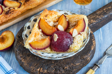 Plum and almond pastry dusted with icing sugar