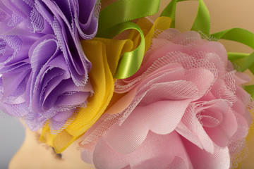 Head of child mannequin with bandage for girls on white background.