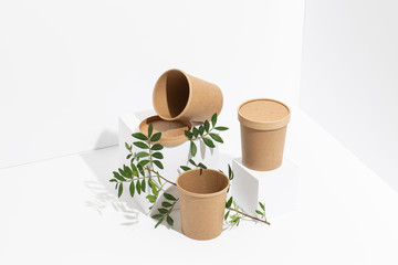 Disposable, recyclable plastic-free bamboo pots over white background