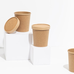 Disposable, recyclable plastic-free bamboo pots over white background