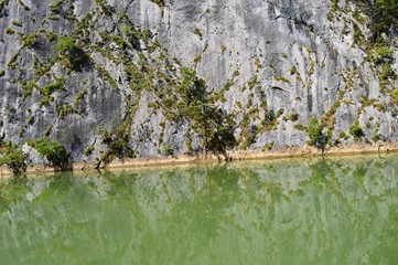 reflection of coastline in the lake