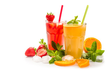 Fruit cocktail in glasses. Fruit drinks made of strawberry, orange, lime, lemon, decorated with mint