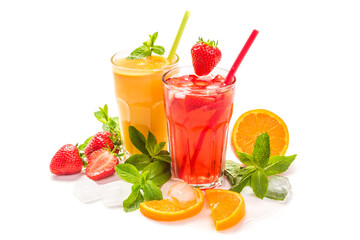 Fruit cocktail in glasses. Fruit drinks made of strawberry, orange, lime, lemon, decorated with mint