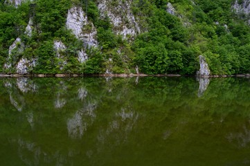 reflection of coastline in the lake