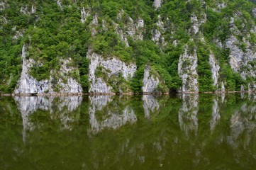 Reflection of the stone in the lake