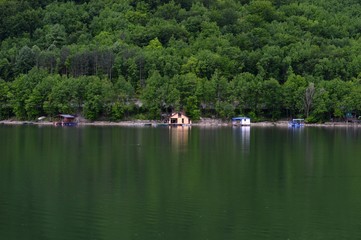 Fototapeta na wymiar reflection of coastline in the lake