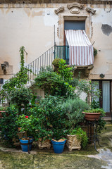 Fototapeta na wymiar Residential building on the Ortygia isle - old town of Syracuse on Sicily island, Italy