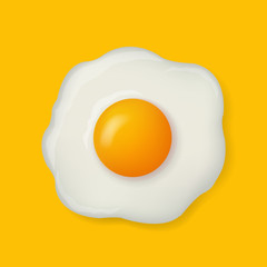 Fried Egg Isolated On Yellow Background