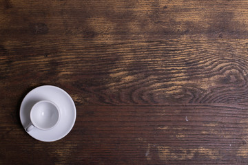 Fototapeta na wymiar Top view of white espresso coffee cup on white saucer