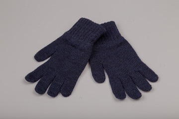 Children's winter gloves on a white background.
