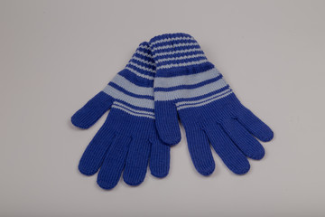 Children's winter gloves on a white background.