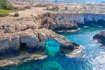 Cyprus Ayia Napa. Bridge of love, view from the sea. Natural stone arch in the sea. Rocks in water....