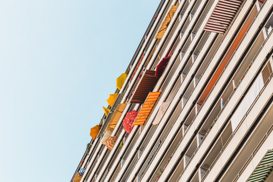 Abstract look of parasols protecting people from the summer sun