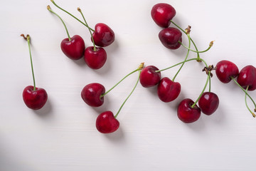 Obraz na płótnie Canvas Top view fresh cherry fruit berries on white background isolated