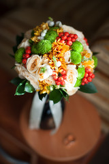 stylish autumn wedding bouquet on a dark background