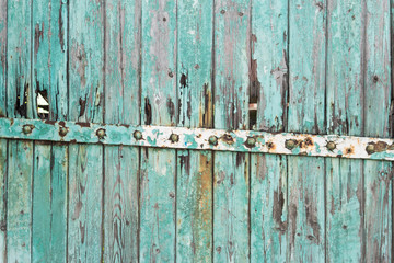 old wooden door with peeling paint