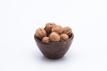 walnuts in a wooden bowl