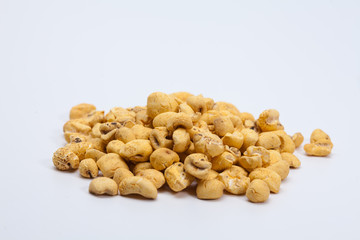 Roasted soft corn snack isolated on white