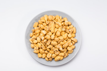 Roasted corn snack in a plate isolated