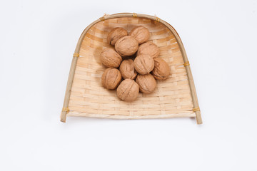 Walnuts in a bamboo winnow basket