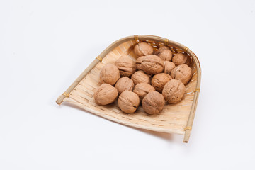 Walnuts in a bamboo winnow basket