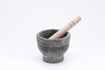 Stone mortar and wooden pestle isolated on white 