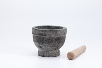 Stone mortar and wooden pestle isolated on white 