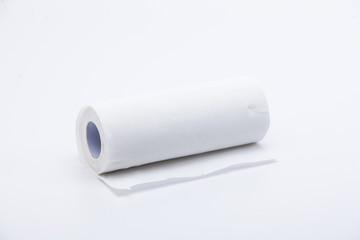 Roll of disposable nonwoven fabric towels isolated