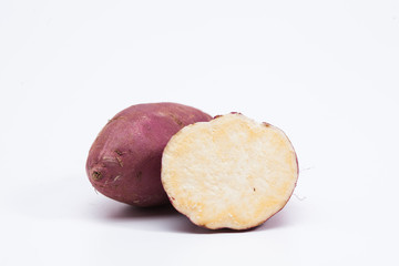 Slice sweet red potato isolated on white