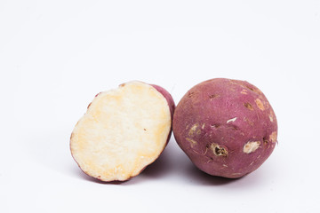 Fototapeta premium Slice sweet red potato isolated on white