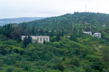 Fototapeta na wymiar House in Mountains and Forest in Tbilisi, Georgia